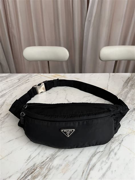 prada fanny pack red logo|Prada belt bag.